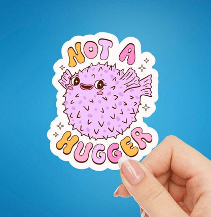 funny mental health sticker. text on sticker center and the text 'not a hugger'. great gift for water bottle sticker lover or kindle sticker lover